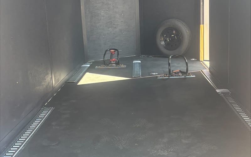 7x16 enclosed trailer interior with full E-Track and spring-assist ramp — Universal City TX